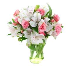 Bouquet of pink roses and white alstromerias
