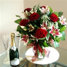 Roses and Lillies Handtied and Champagne Gift